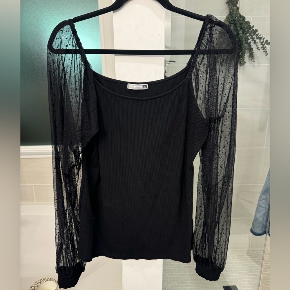 Black sweater with sheer sleeves